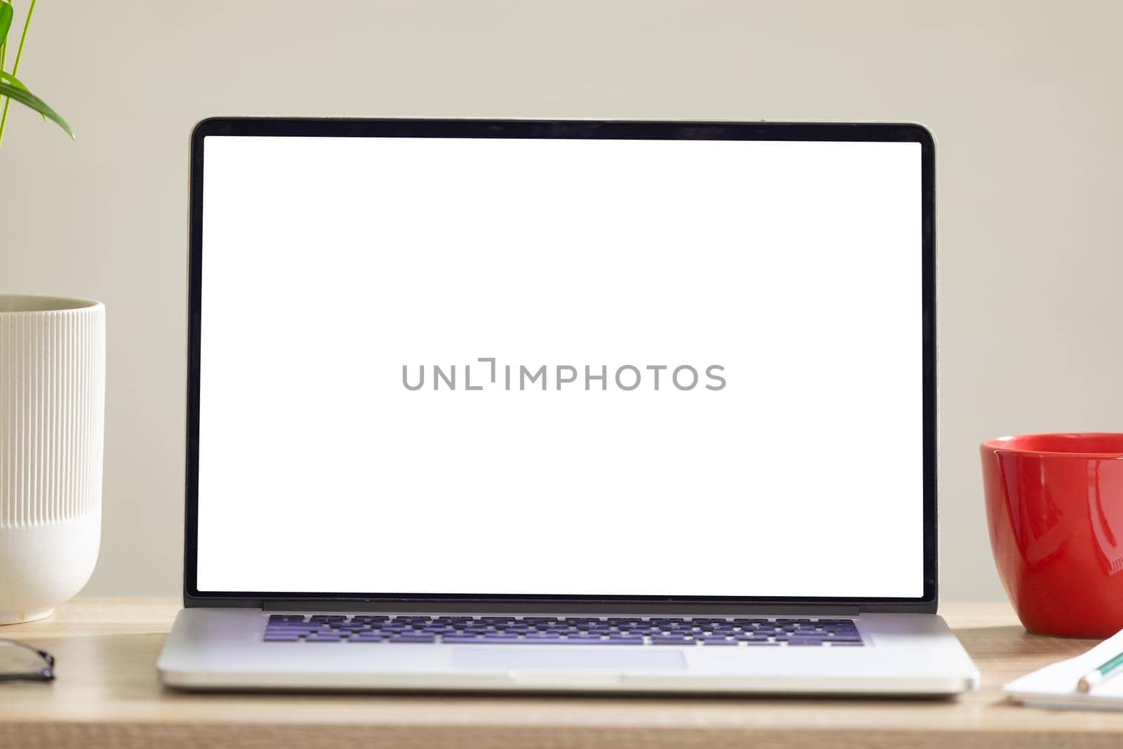 Composition of laptop with copy space on white background. modern office communication and technology concept.