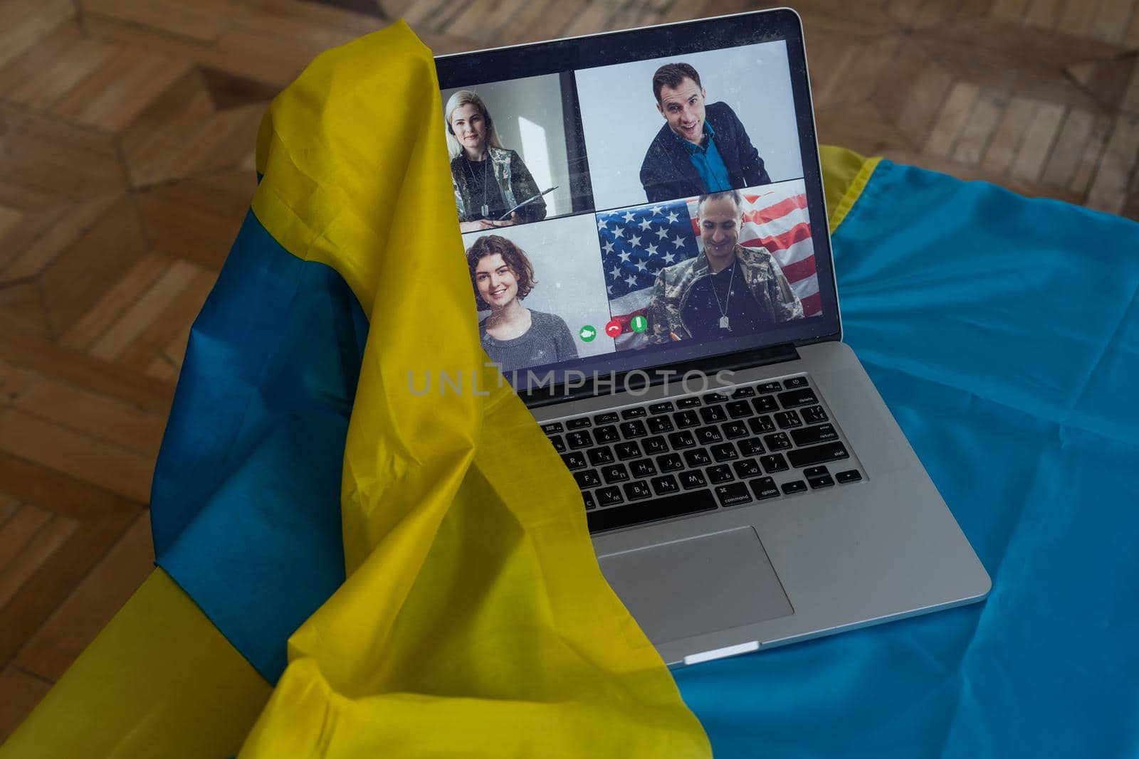 news about Ukraine on laptop. flag of ukraine background