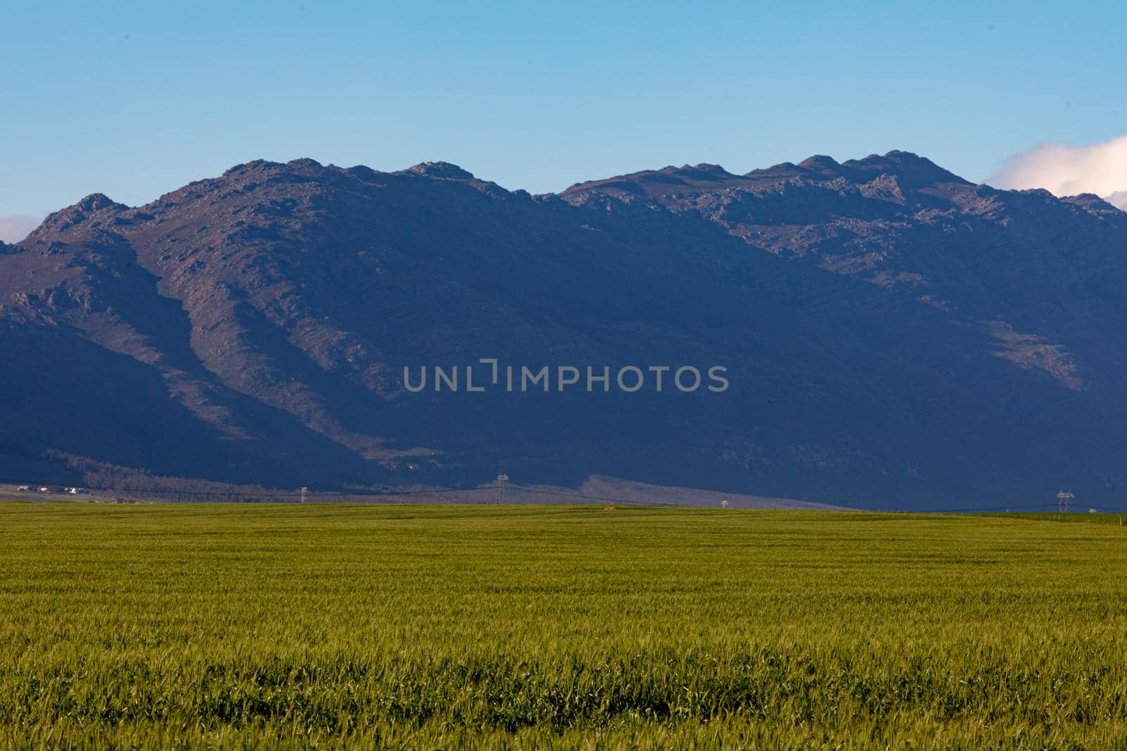 General view of countryside landscape with cloudless sky. environment, sustainability, ecology, renewable energy, global warming and climate change awareness.