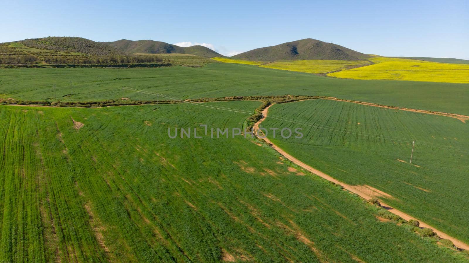 General view of countryside landscape with cloudless sky. environment, sustainability, ecology, renewable energy, global warming and climate change awareness.