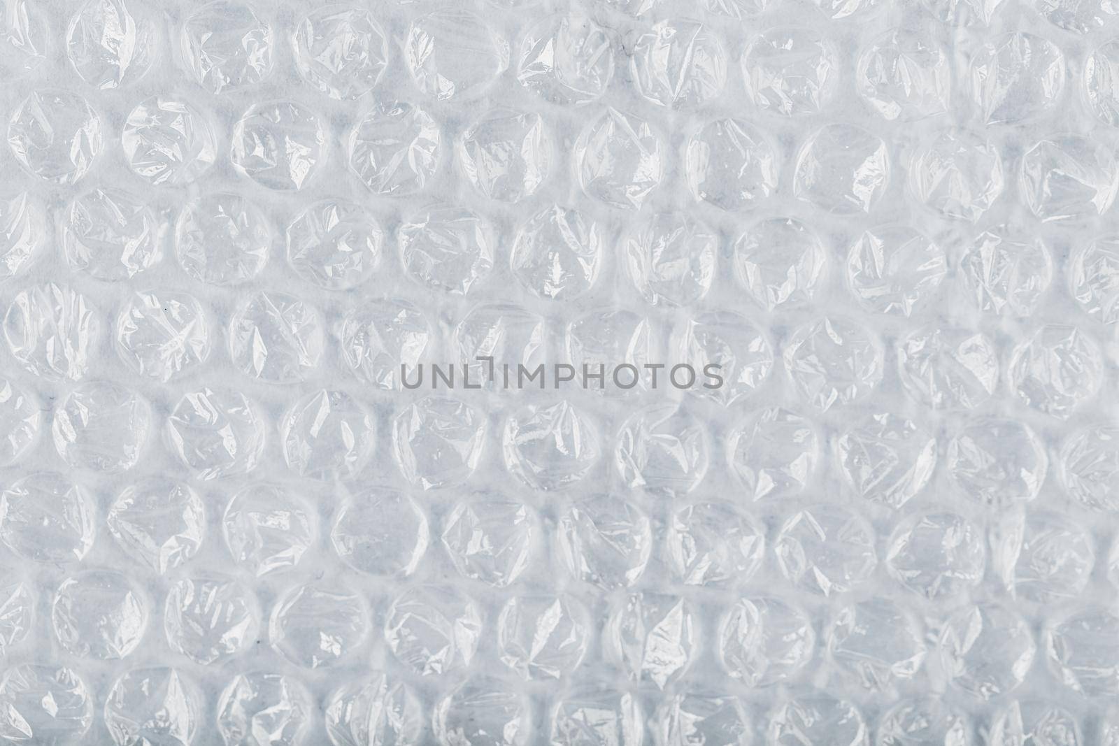 Packing bubble wrap for parcels on a White background in full screen