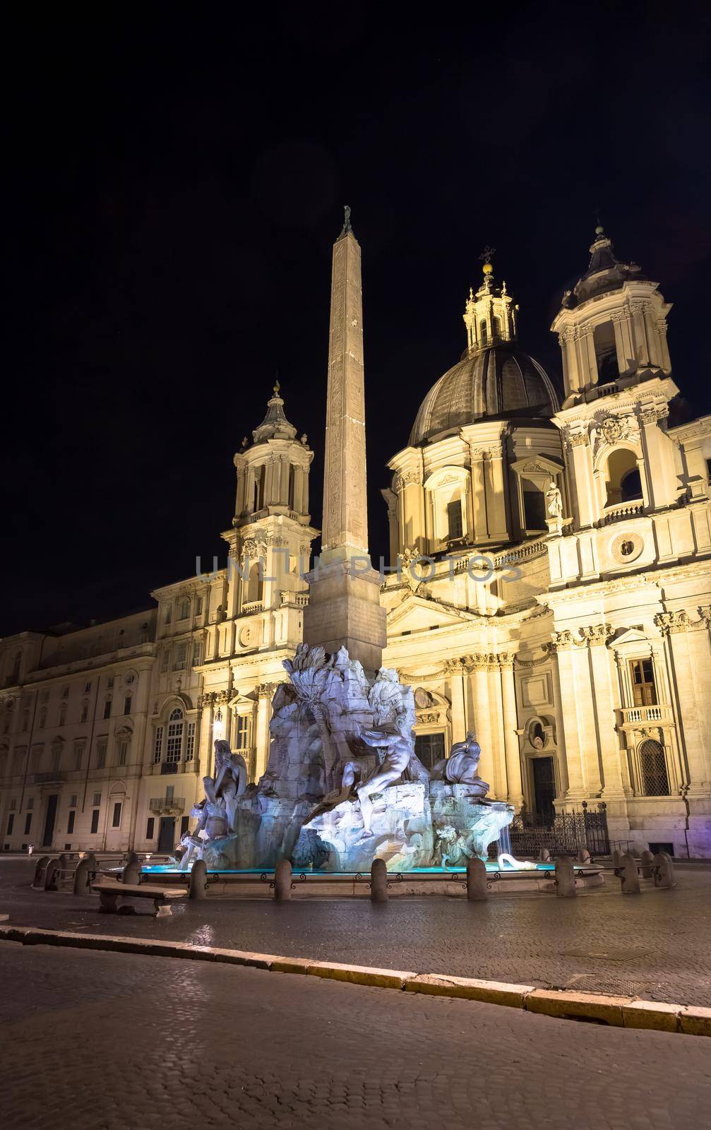 ROME, ITALY - CIRCA AUGUST 2020: Piazza Navona (Navona's Square) with the famous Bernini fountain by night.