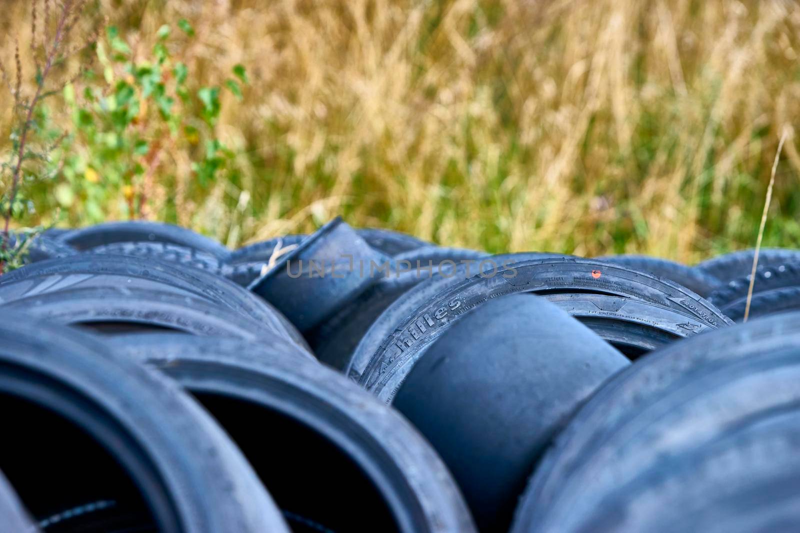 a pile of used rubber on the ground. color nature by lempro