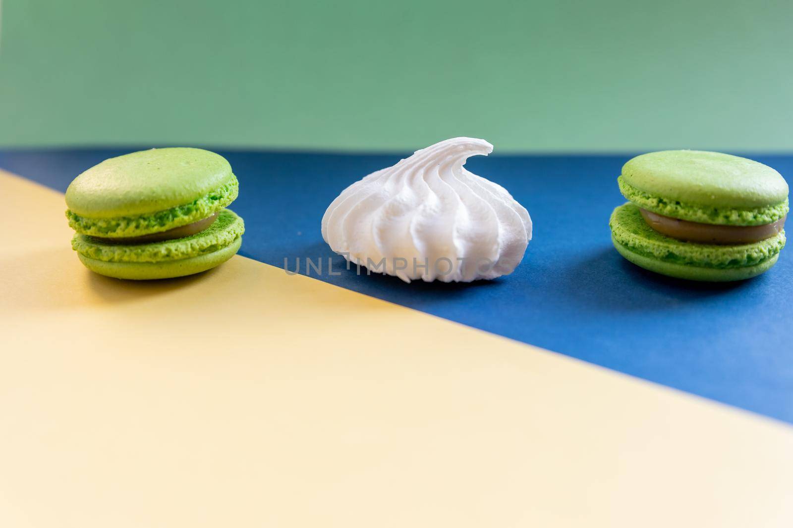 Regular creative pattern of colorful french cookies macarons. Pop art style banner.