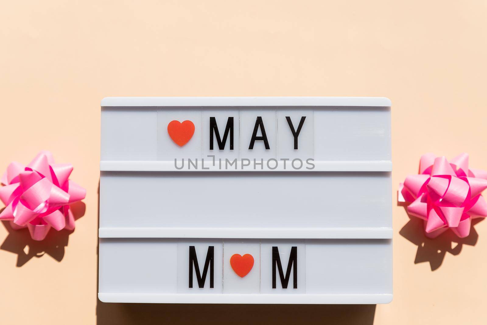 Happy Mother's Day card concept. Wooden calendar, top view, flat lay