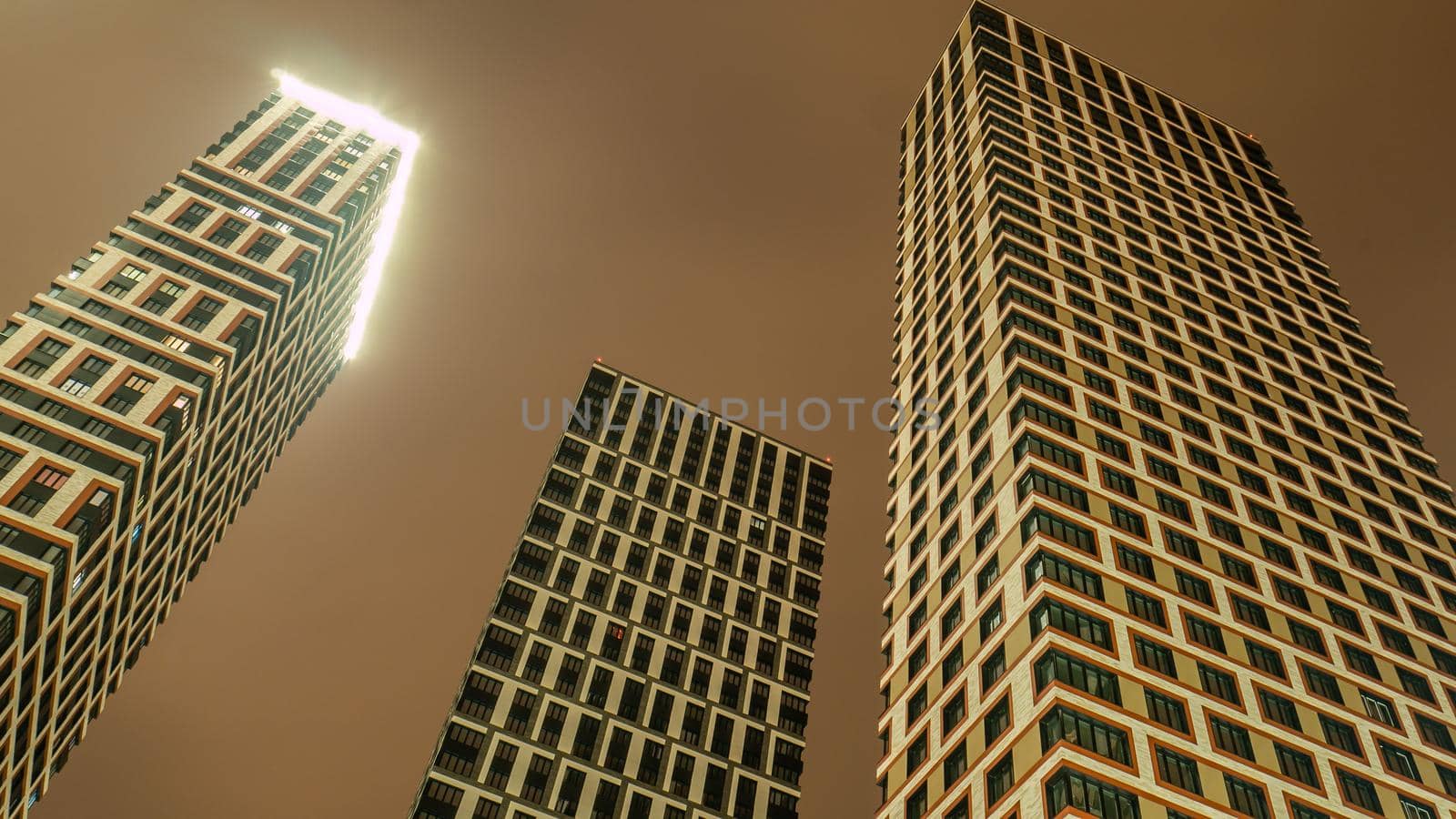 new multi-storey residential building with balconies .the new Russian district. evening shooting