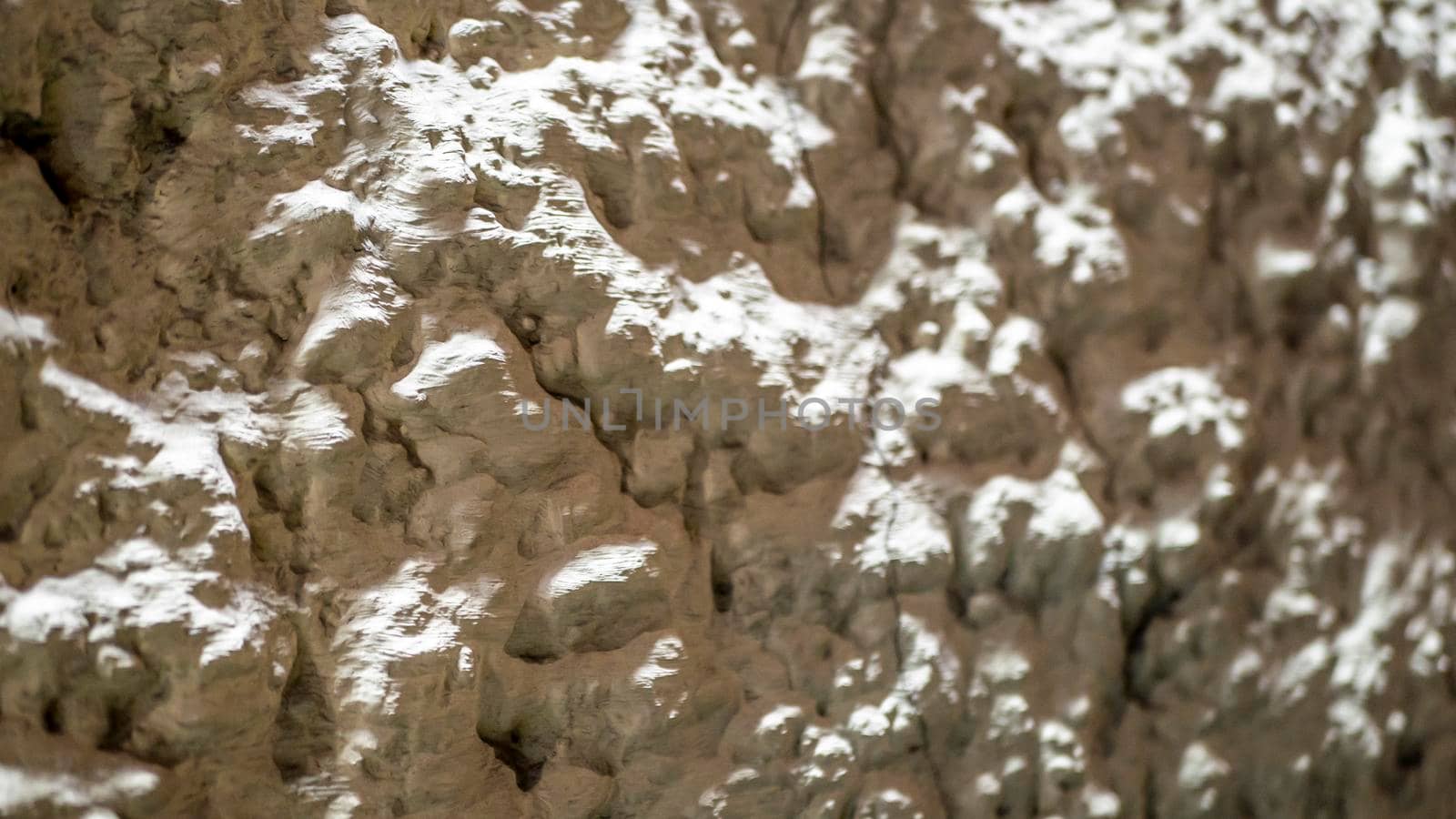 Cracked of concrete floor, close-up shots in very low light, outdoor. color