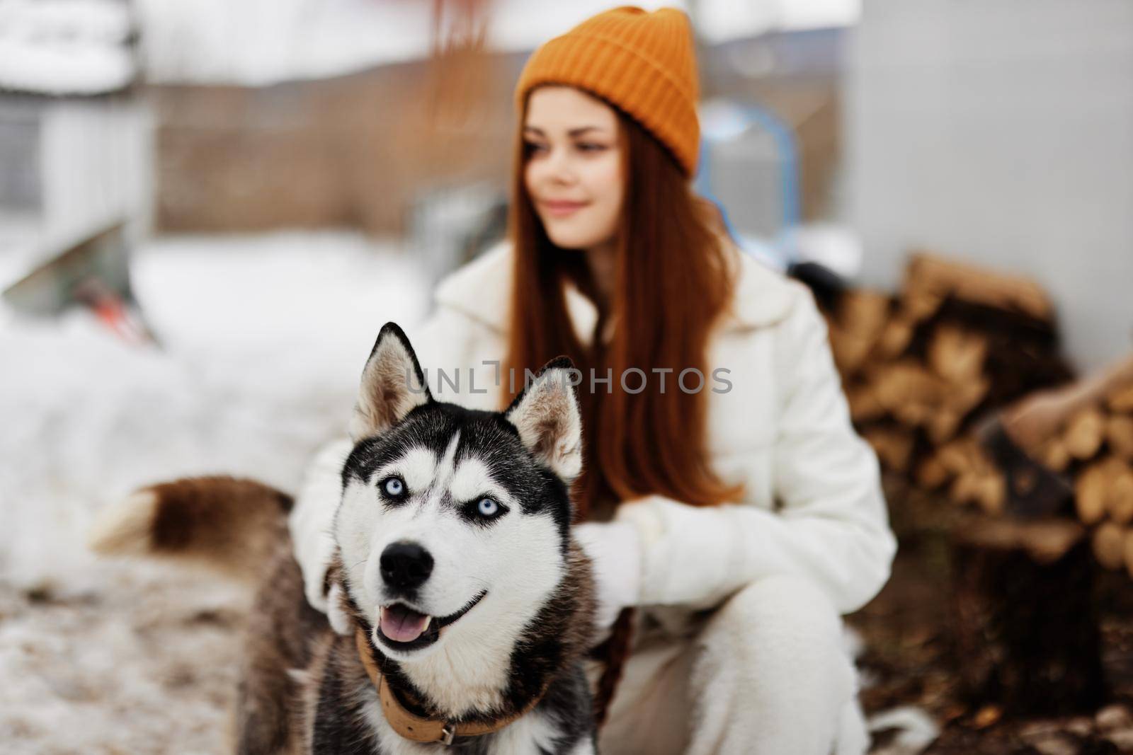 cheerful woman on the snow walk play rest winter holidays. High quality photo