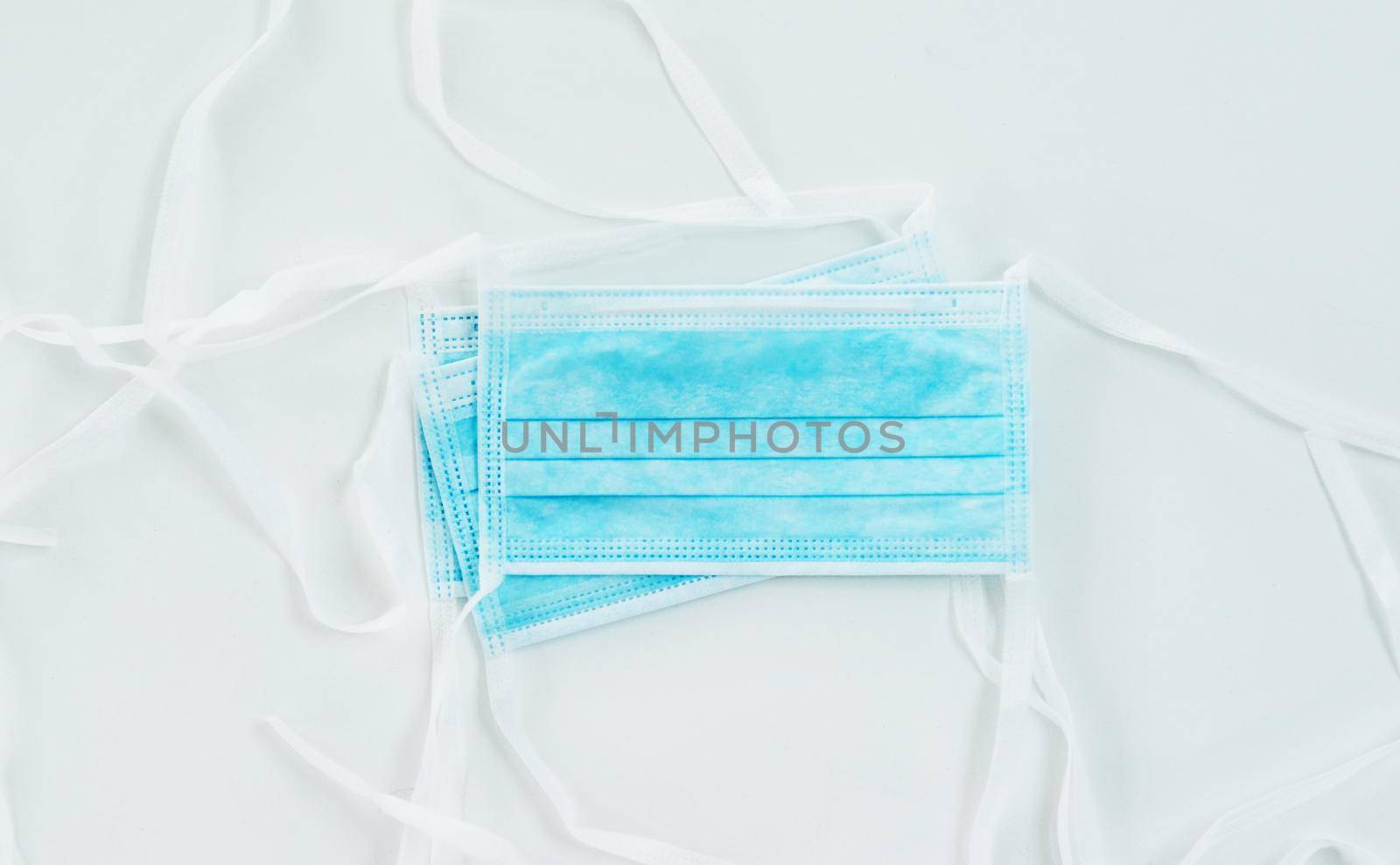 Shot of surgical masks against a white background.