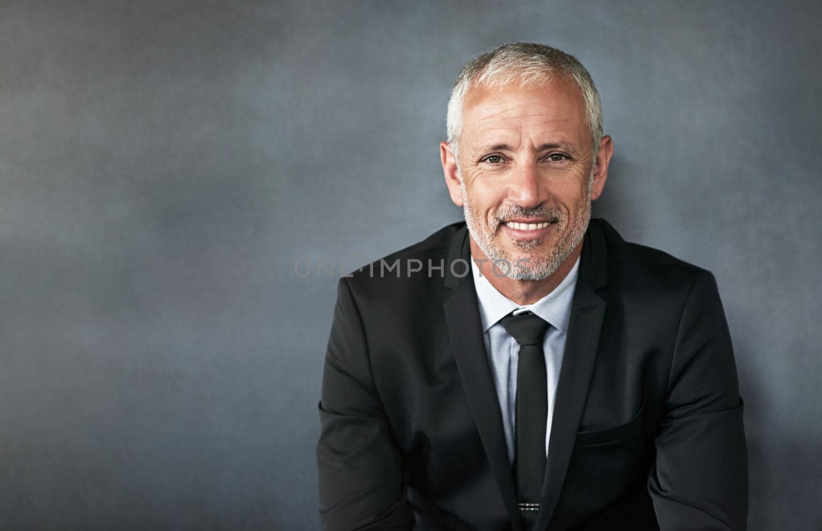 Cropped shot of a handsome mature businessman in corporate attire.