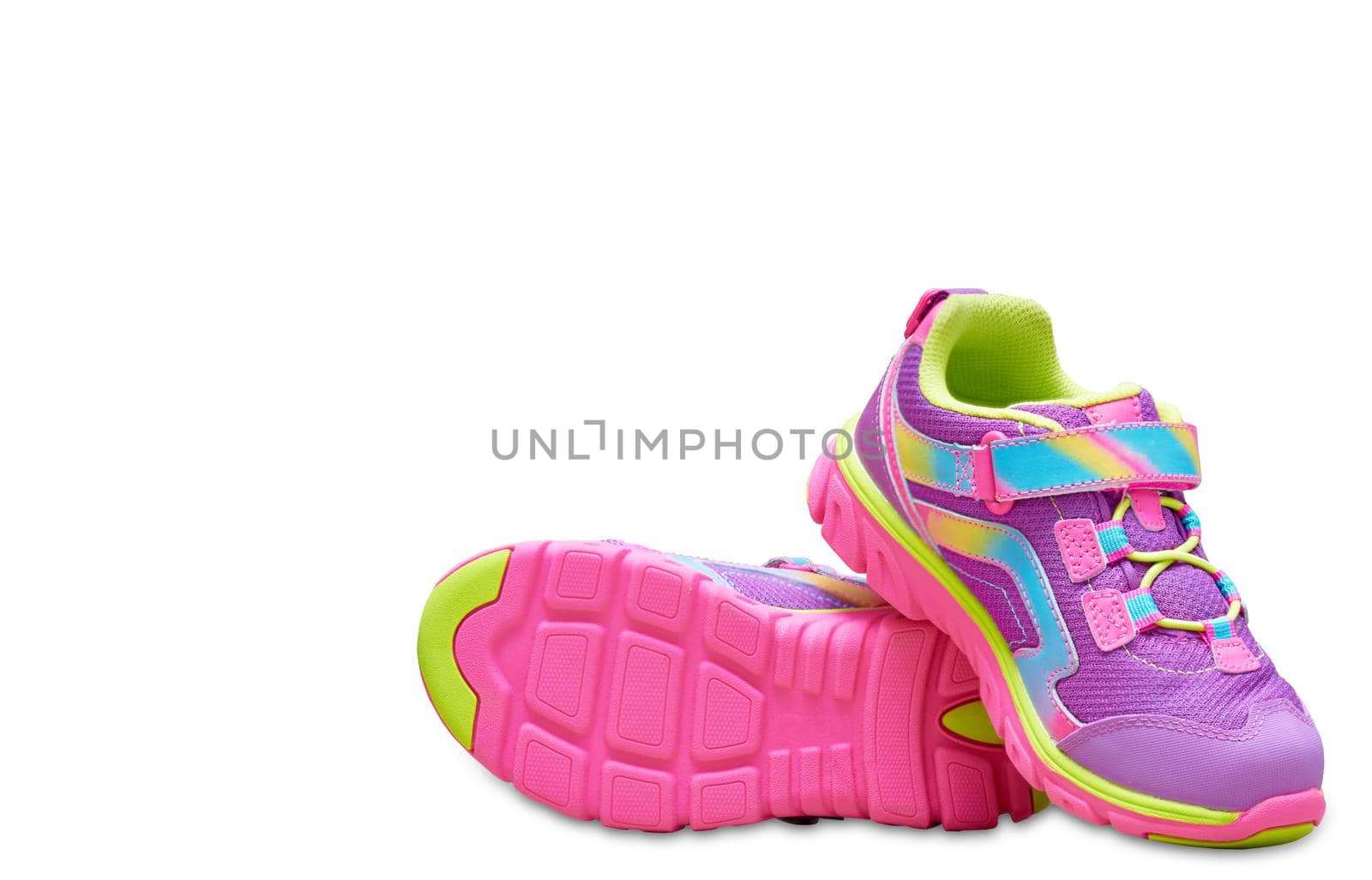 colorful kid shoes on isolated white background by VacharapongW