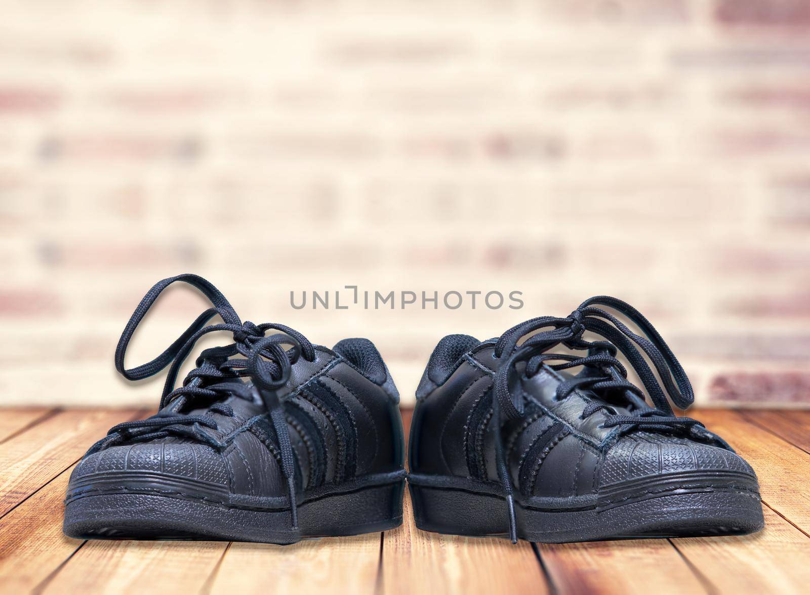 black student shoe with shoelaces by VacharapongW