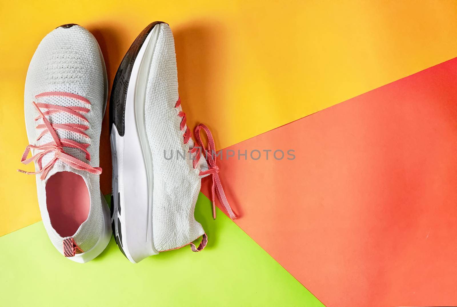 running shoes on colorful background