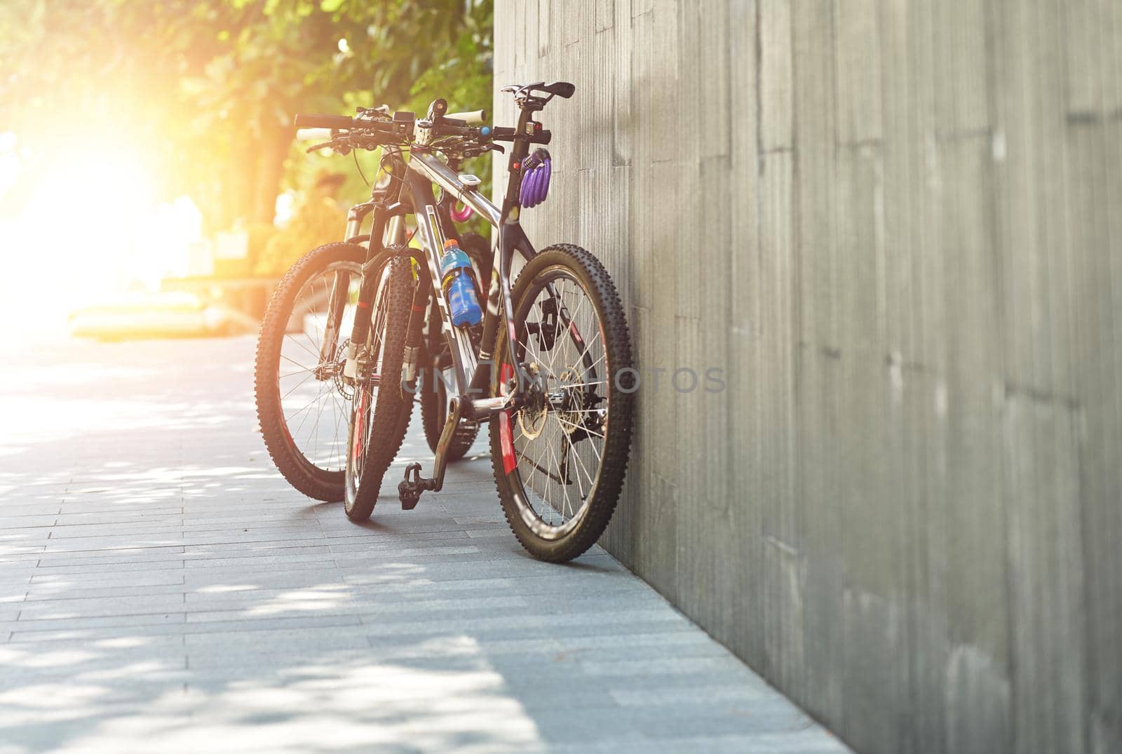 bicycles of cyclist travel parking with sun