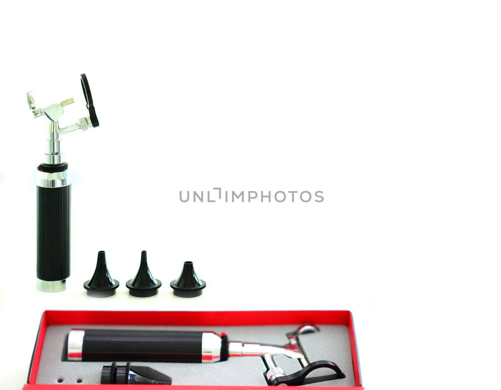 Otoscope for ear check for doctor ENT in box on blur background