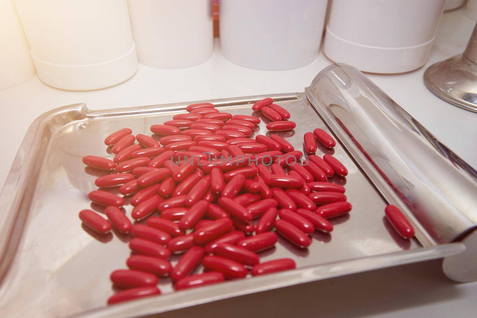 pills on medinine tray in drug store in health concept