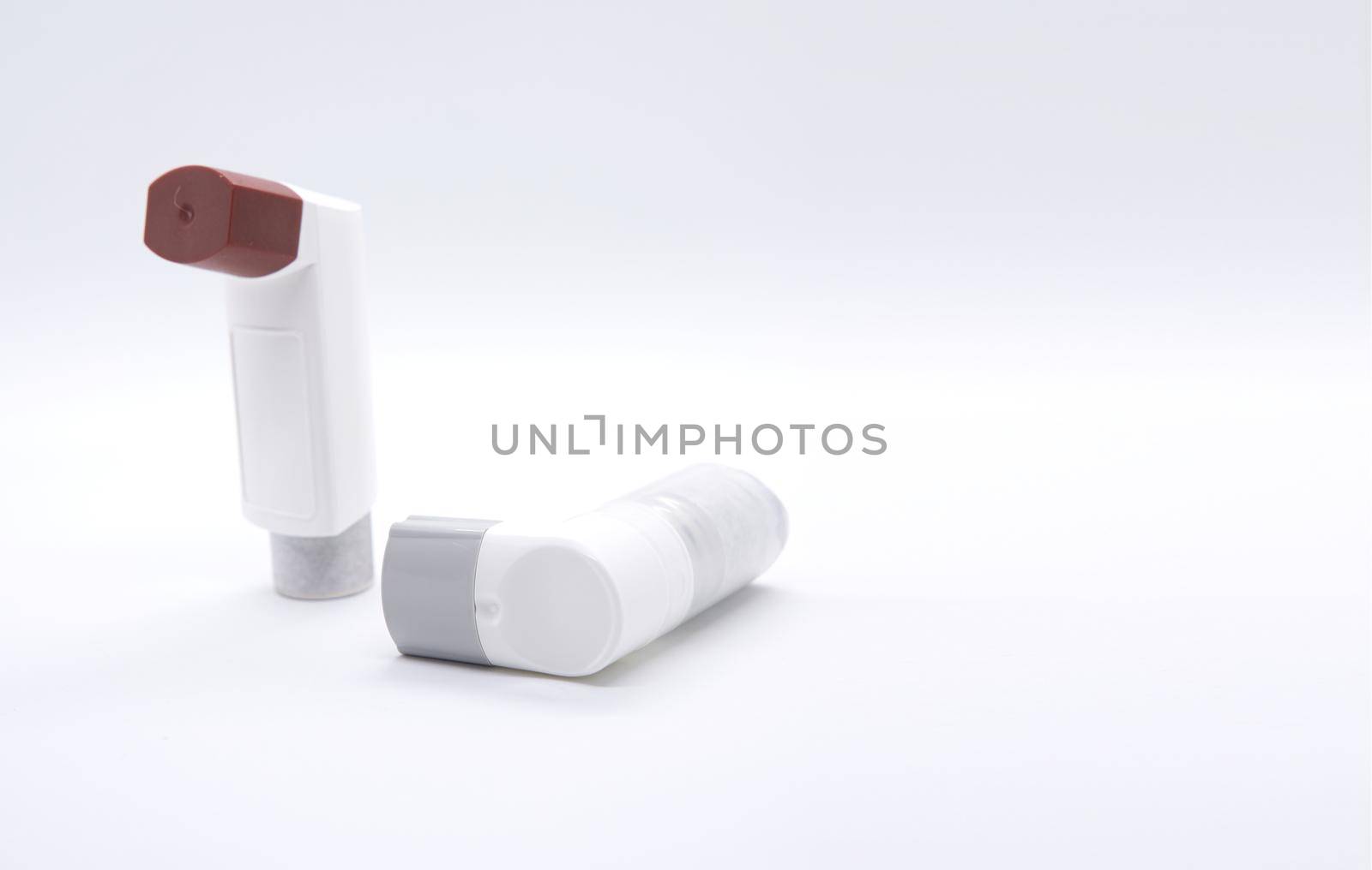 drug for asthma called medicine inhaler and for allergy treatment on white