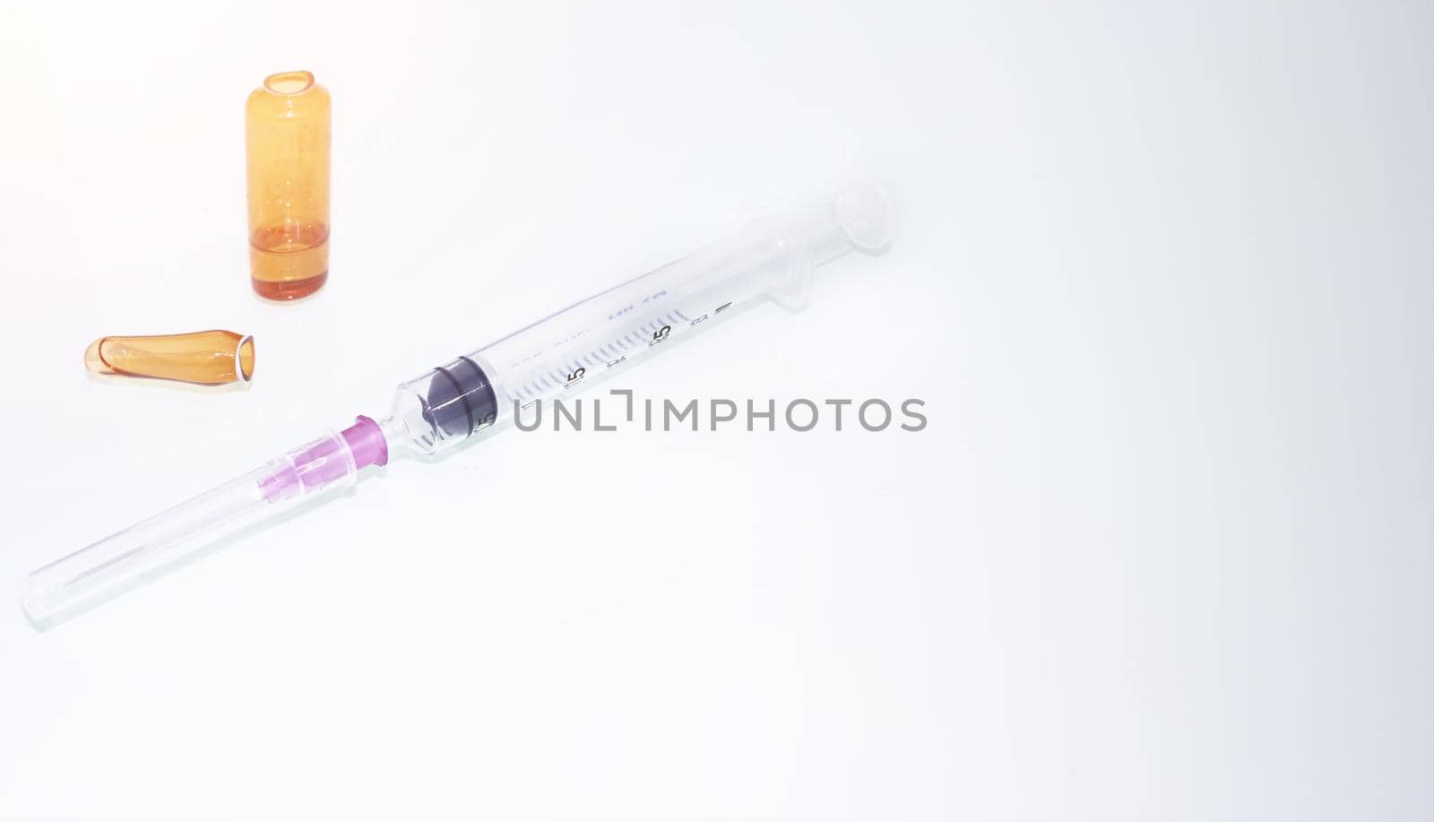 syringe ampule with copy space in medicine background concept