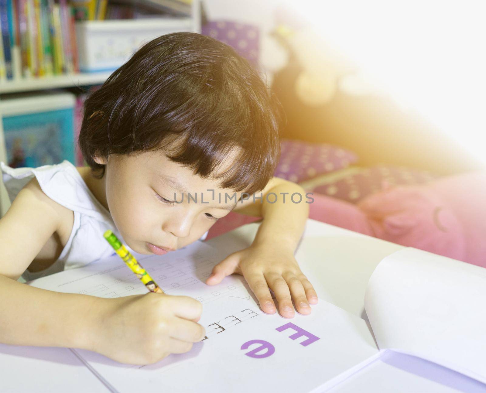 boy kid write on table with sun