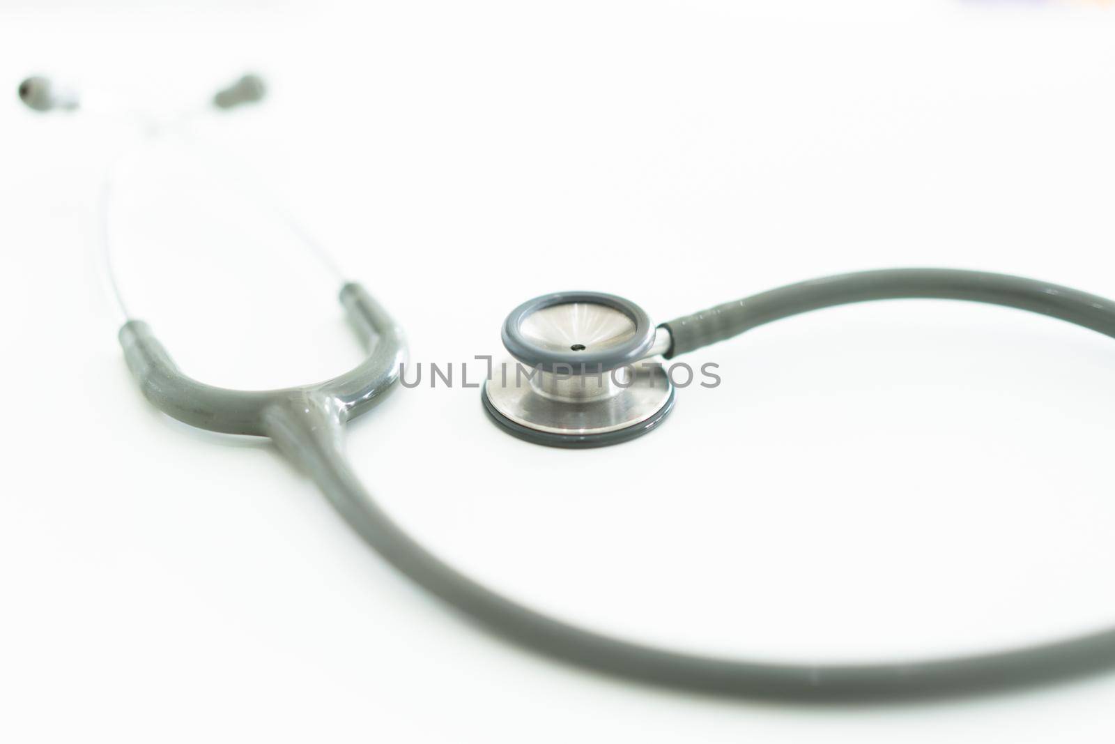 stethoscope on doctor table in hospital for medicine concept