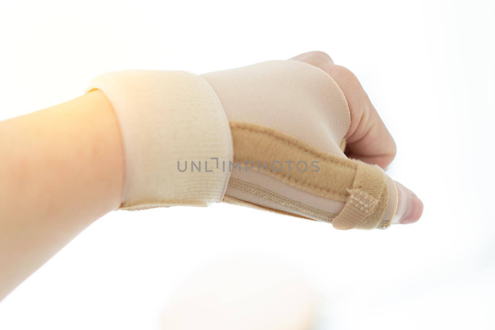 wrist bandage for support arm pain with care show finger like brace in medicine sprain bone by VacharapongW