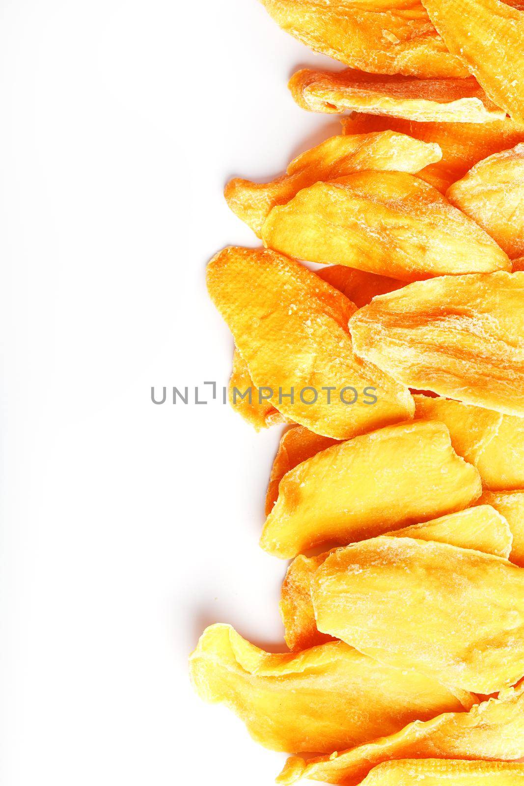Orange Slices of Dried Sugar Mango Isolated on White Background