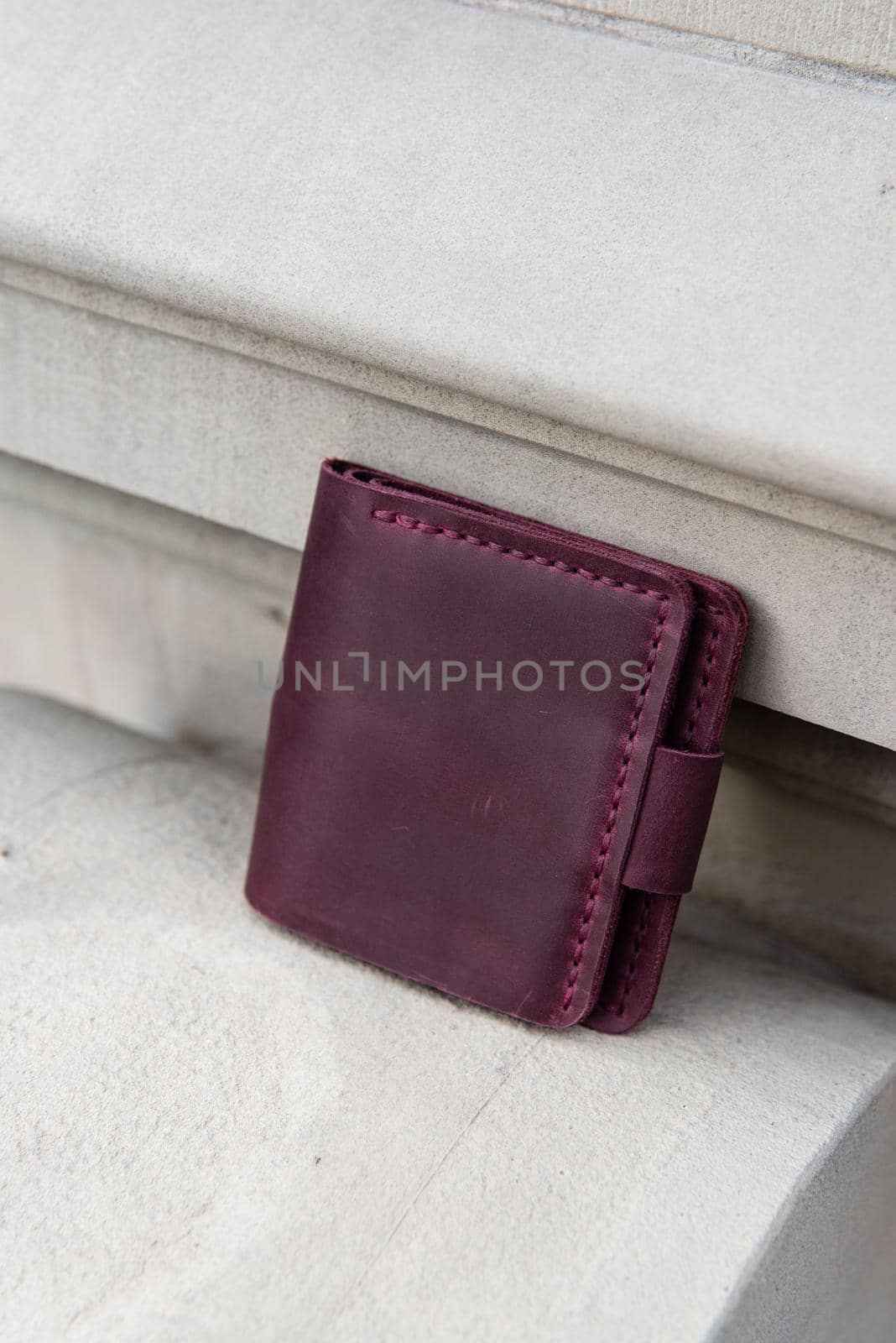 hand made leather wallet . Leather craft. Selective focus by Ashtray25