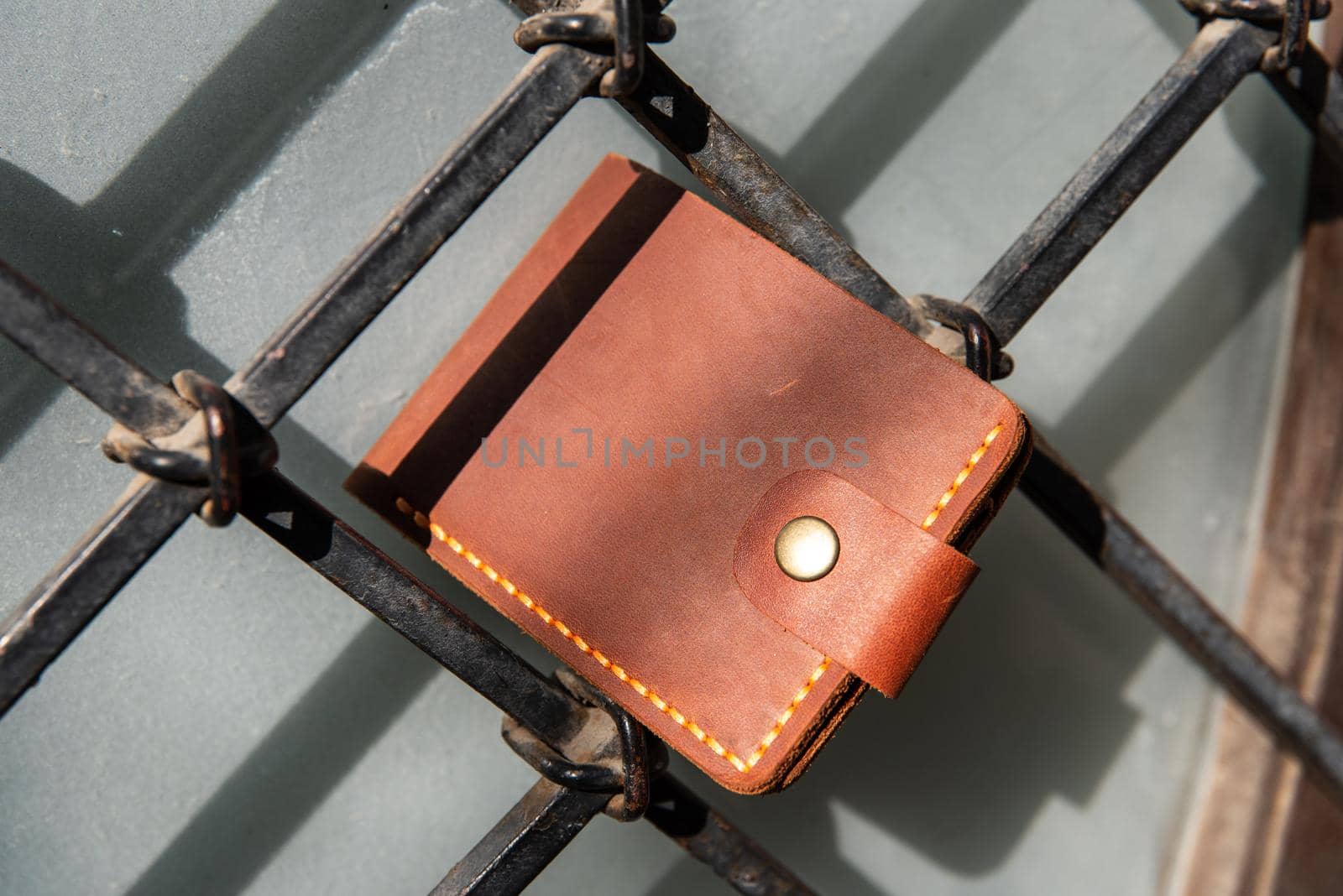 hand made leather wallet . Leather craft. Selective focus.