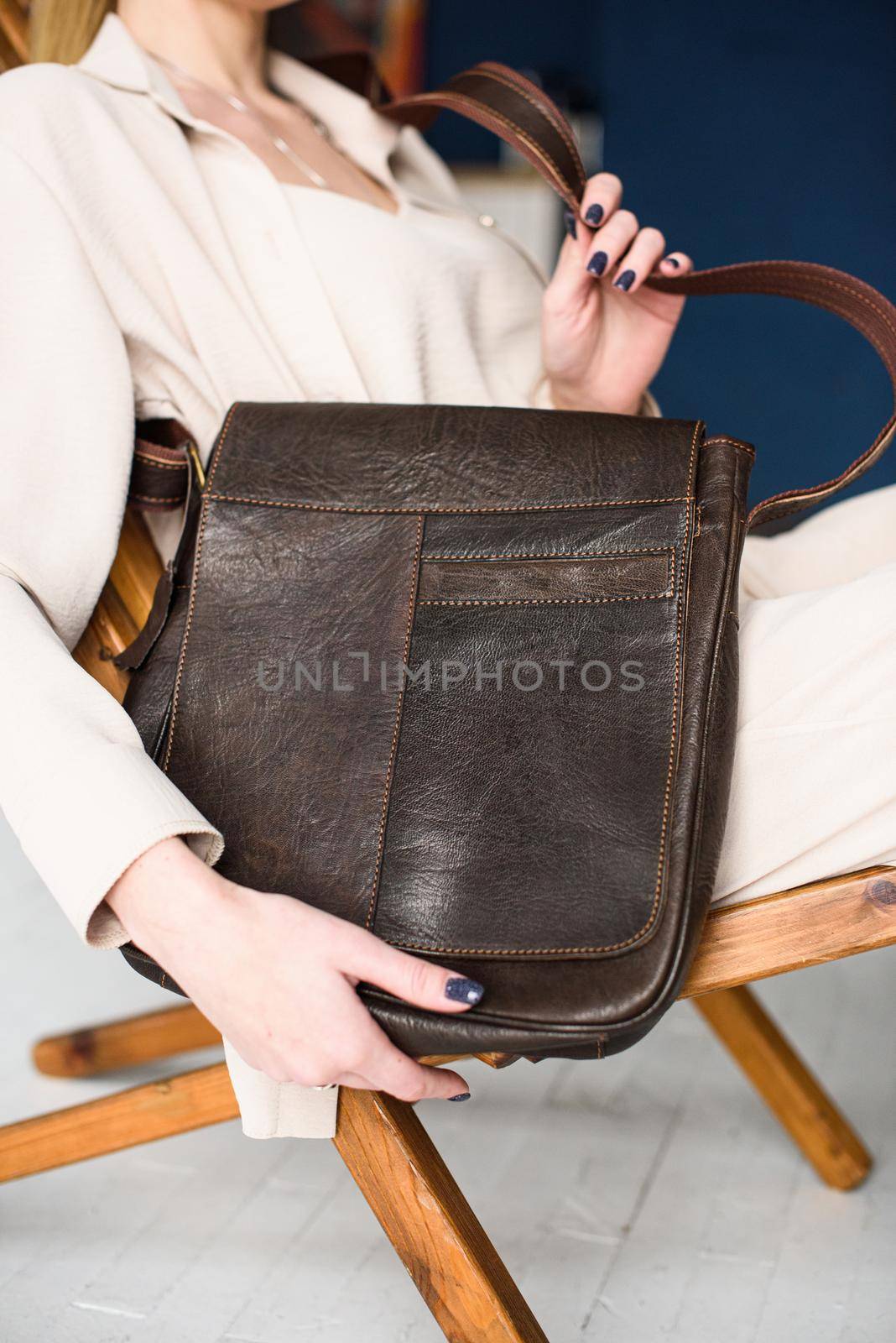 close-up photo of brown leather bag . indoor photo