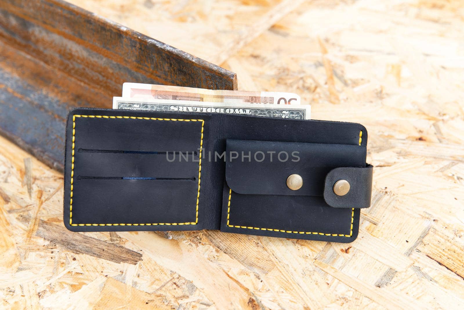 hand made leather wallet . Leather craft. Selective focus.