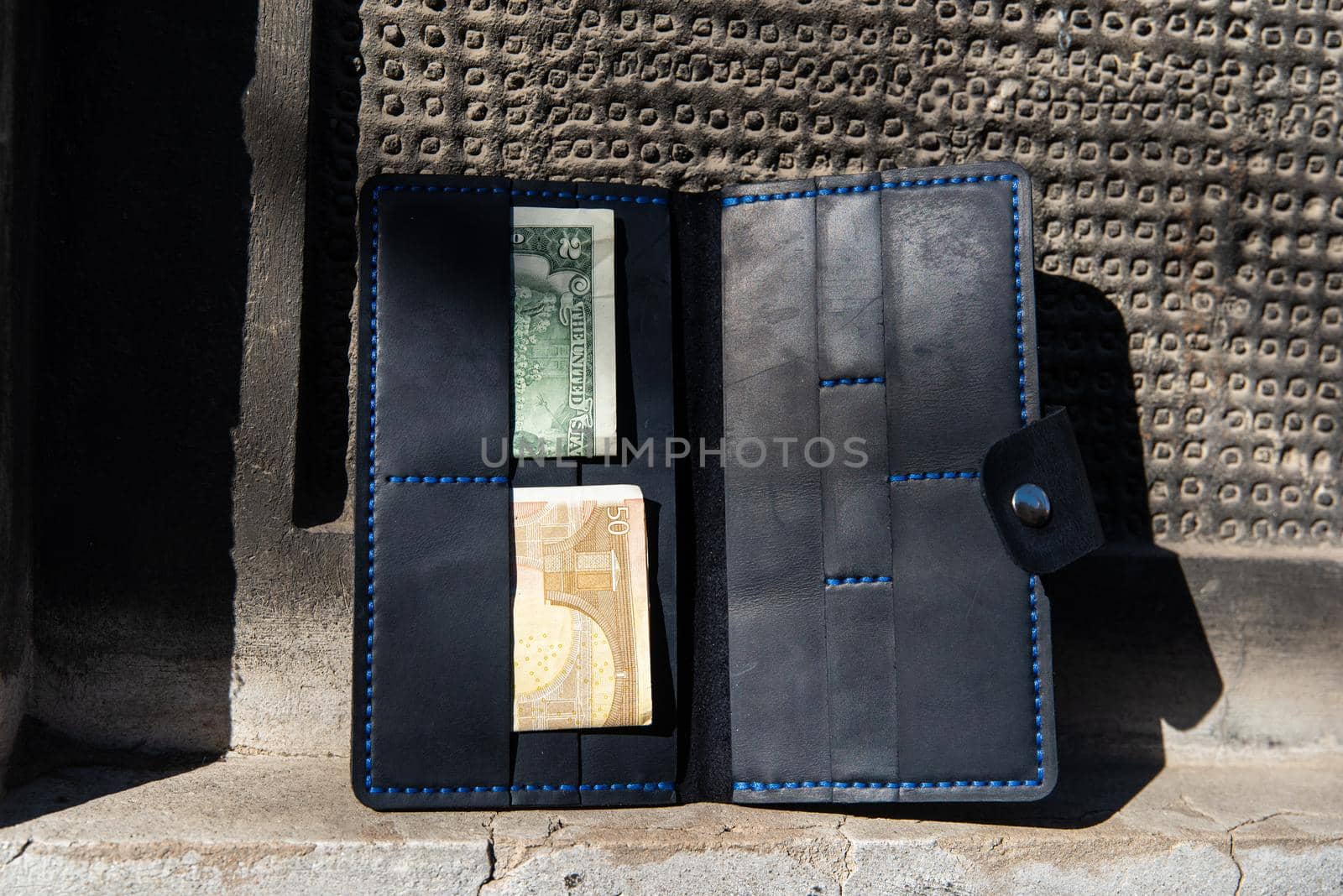 hand made leather wallet . Leather craft. Selective focus.