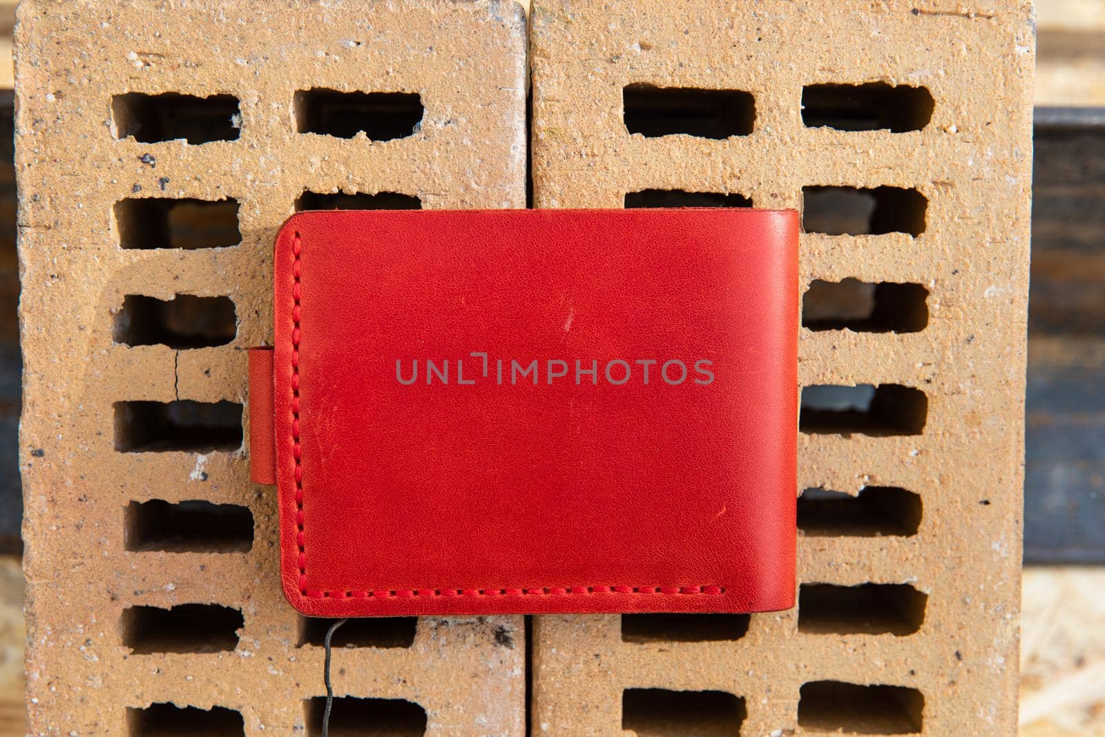 hand made leather wallet . Leather craft. Selective focus.