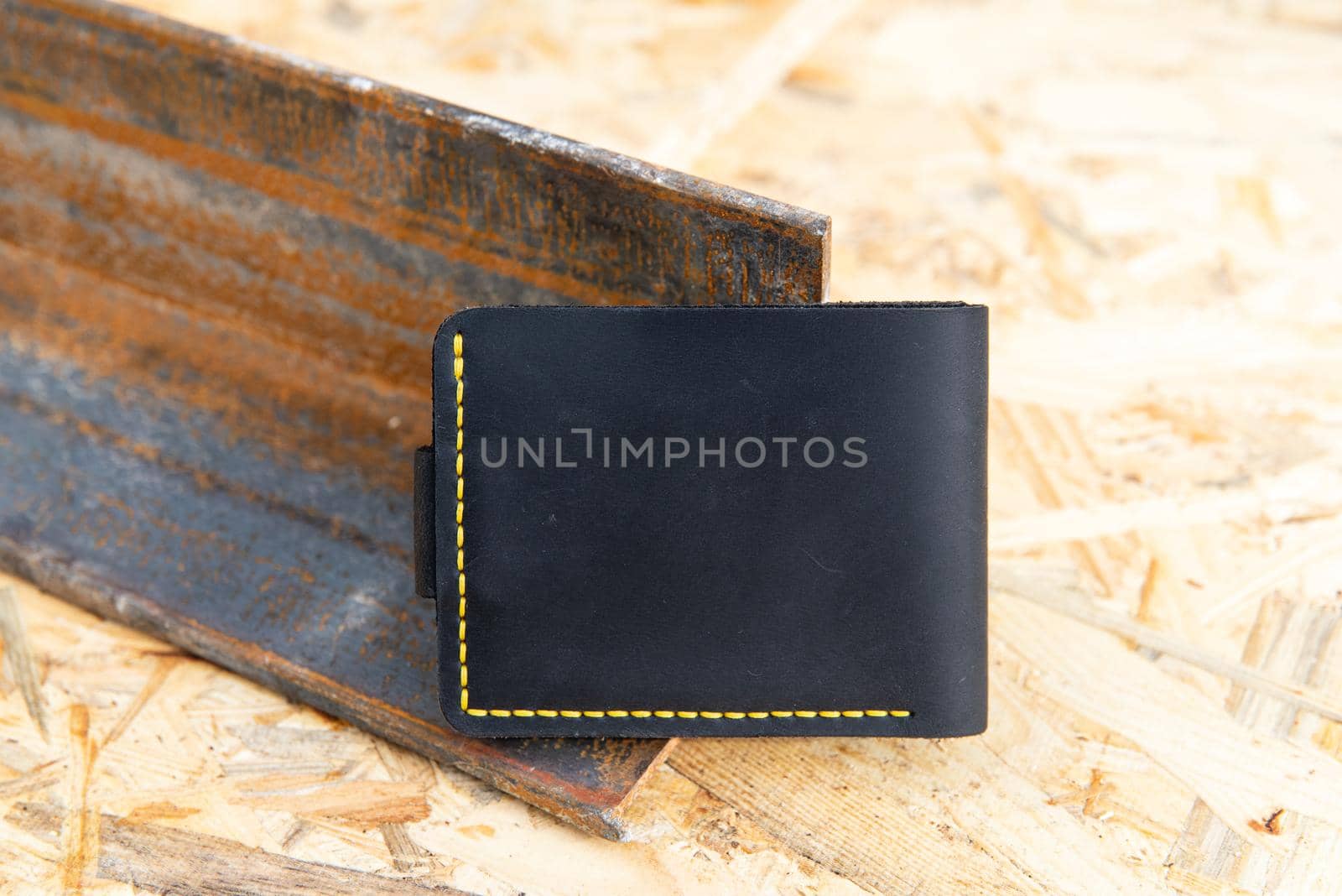 hand made leather wallet . Leather craft. Selective focus.