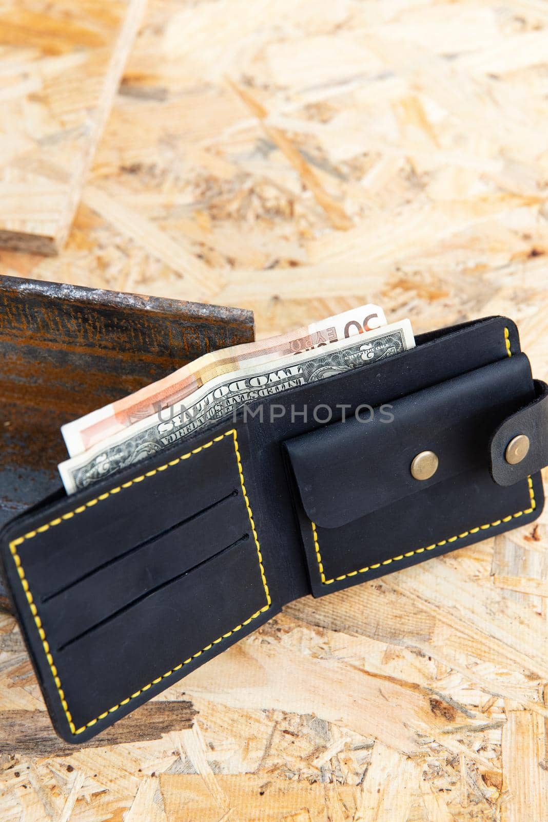 hand made leather wallet . Leather craft. Selective focus.