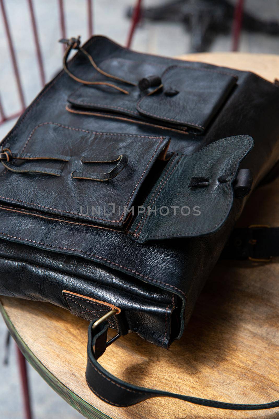 close-up photo of black leather bag corporate. street photo