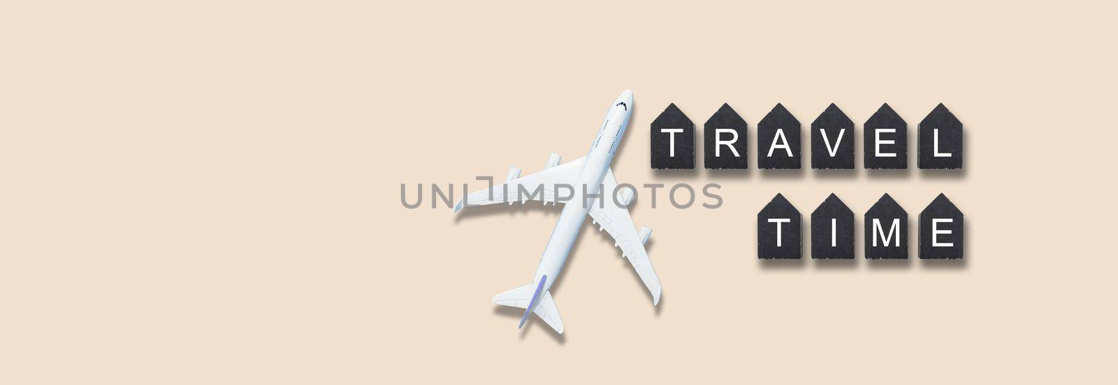 Airplane model. White plane on background. Travel vacation concept. Summer background. Flat lay, top view, copy space. High quality photo