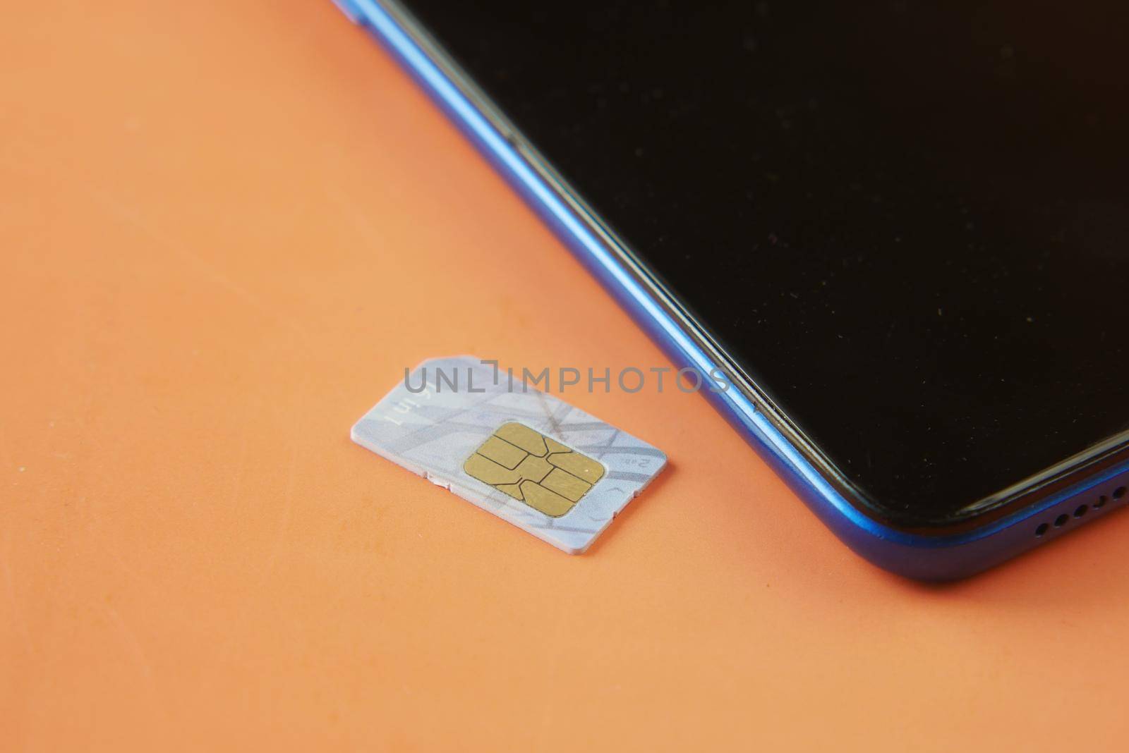 A sim card for a smart phone on table .