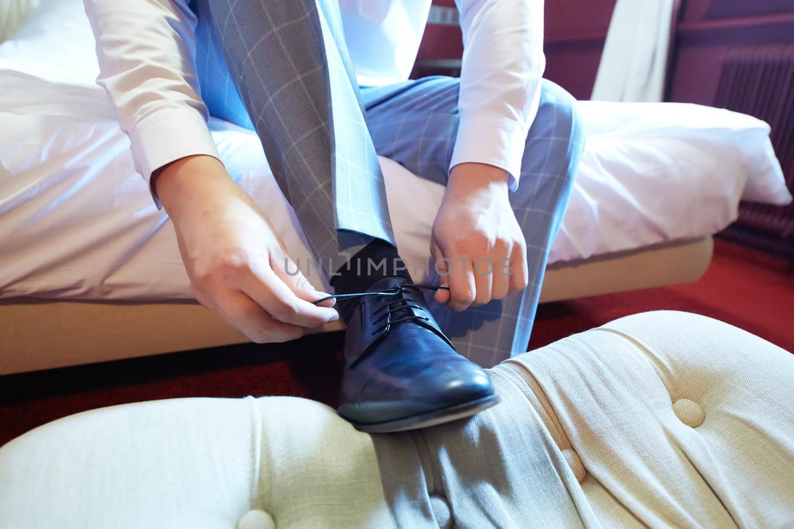 Business man or groom dressing up with classic elegant shoes. Shallow dof