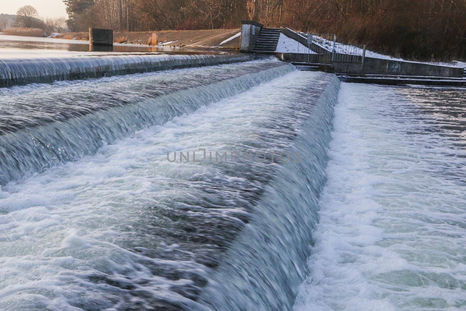 Downward flow of water from a body of water. by gelog67