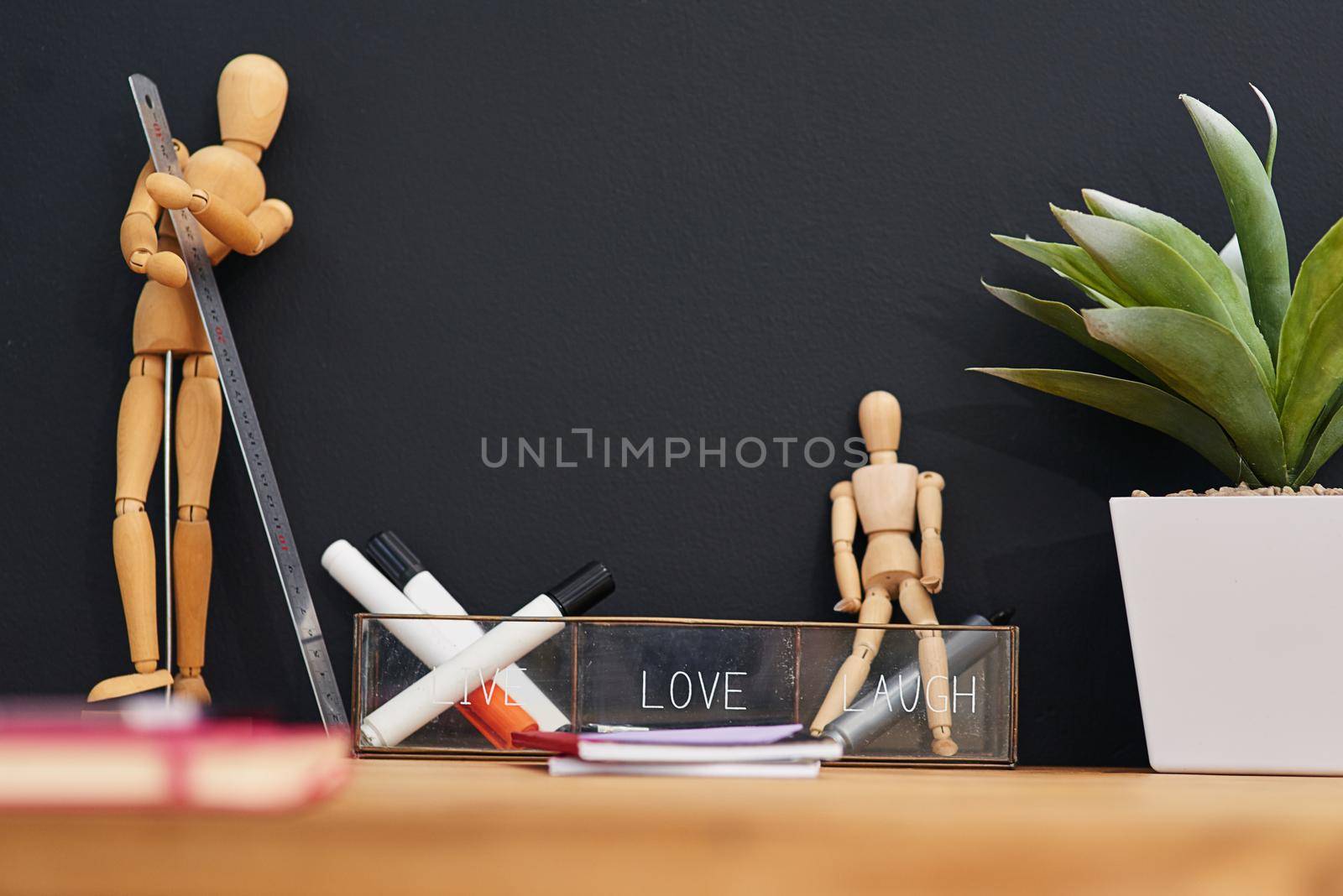 Desk decor. Shot of various accessories on a work desk. by YuriArcurs