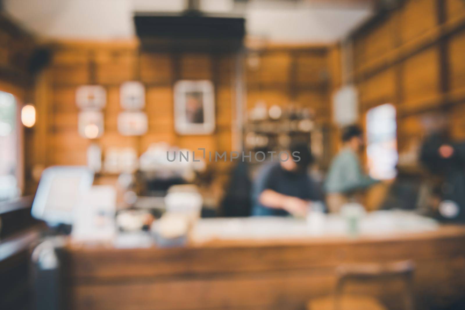 Coffee Cafe Shop Background, Abstract Defocused Blur of Interior Coffee Shop and Restaurant. Coffee Interiors Bar Space for Customer Relax. Blurry Bokeh Light Bulb in Cafe Store by MahaHeang245789