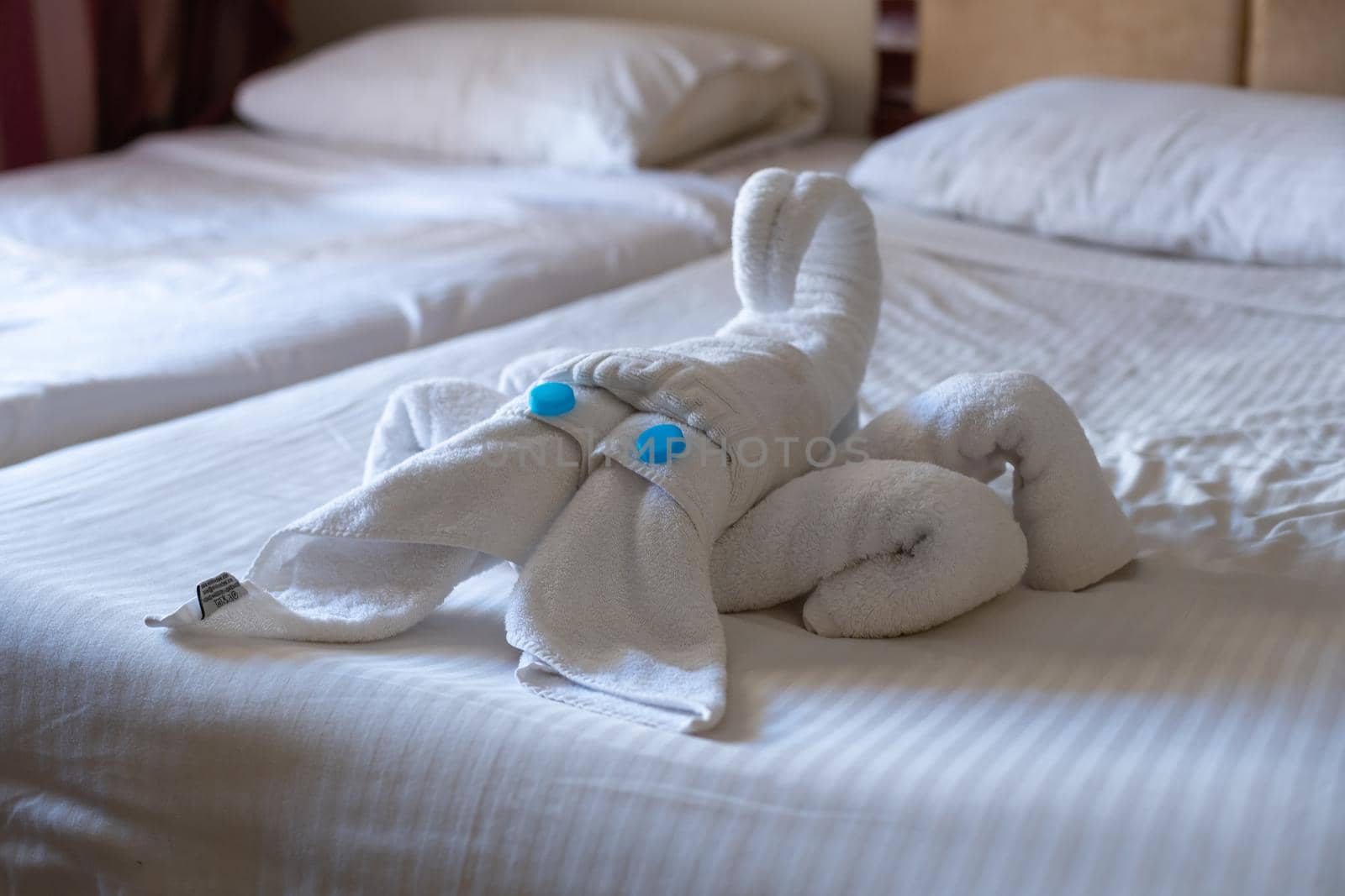 figure of towels on the bed. figurine Of Towels On Bed.