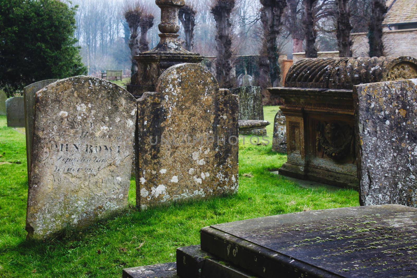 Tombs and headstones in a typical English church graveyard