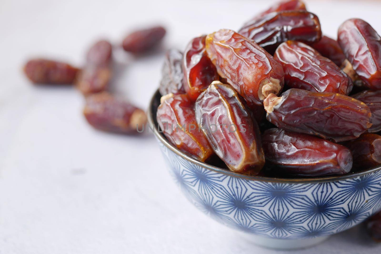 close up of fresh date fruit in a bowl