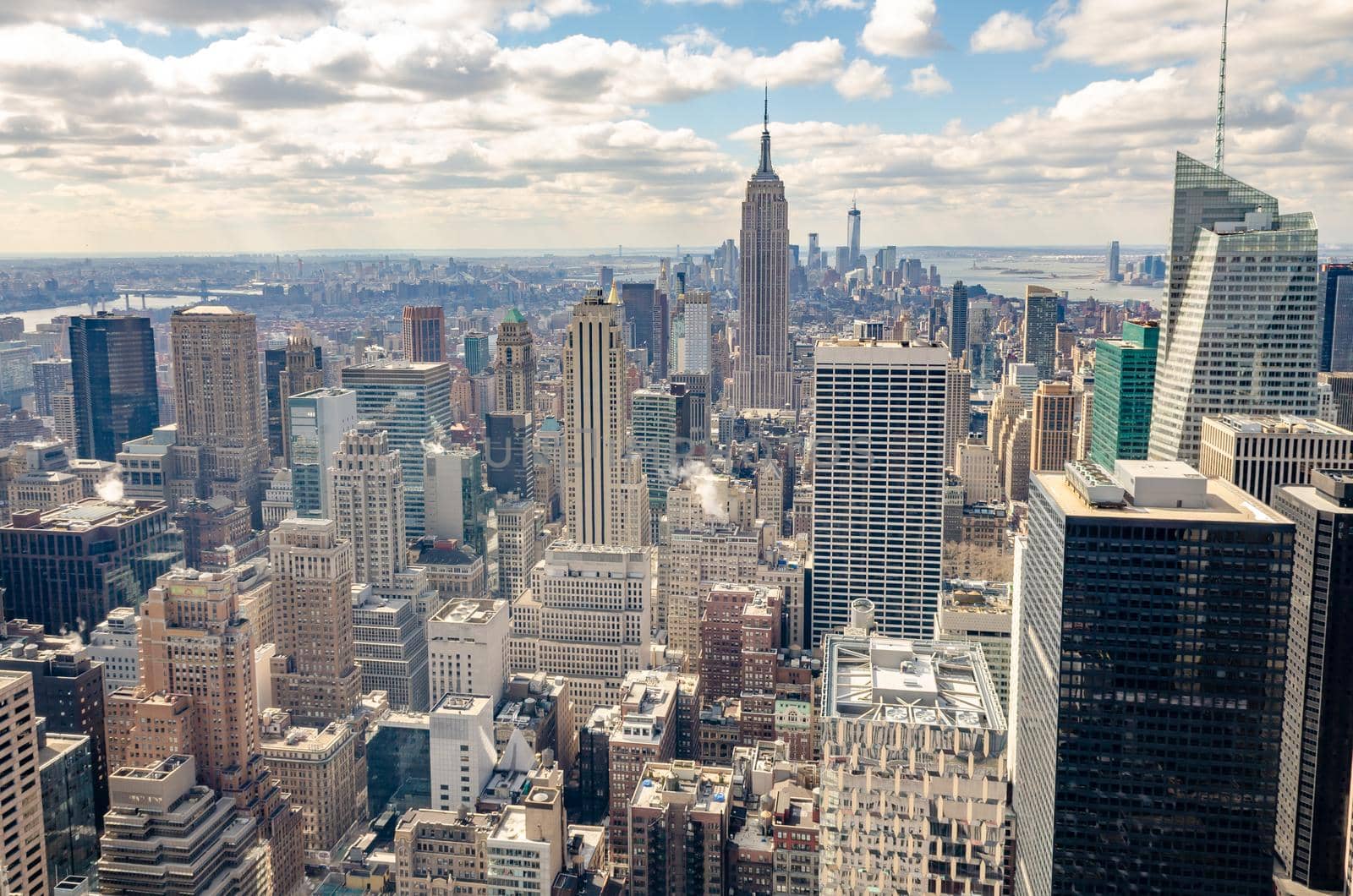 Manhattan Skyline with Empire State Building, aerial view, from Rockefeller Center, New York City during winter, horizontal