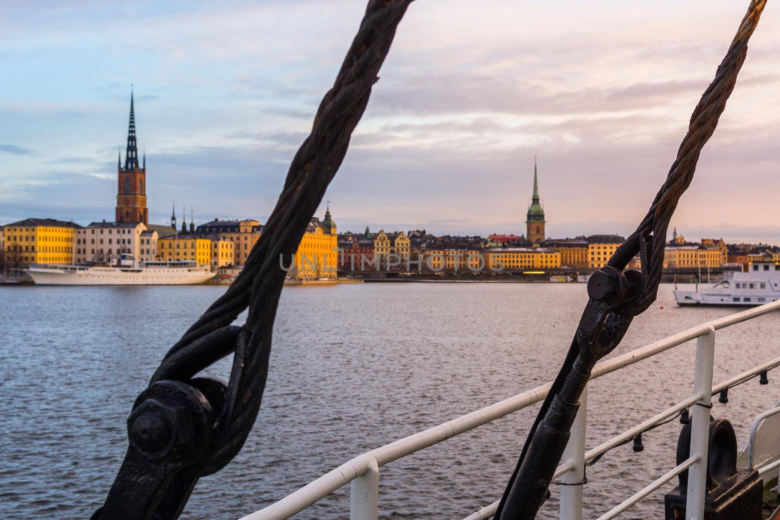 Stockholm Skyline with boat in forefront by bildgigant