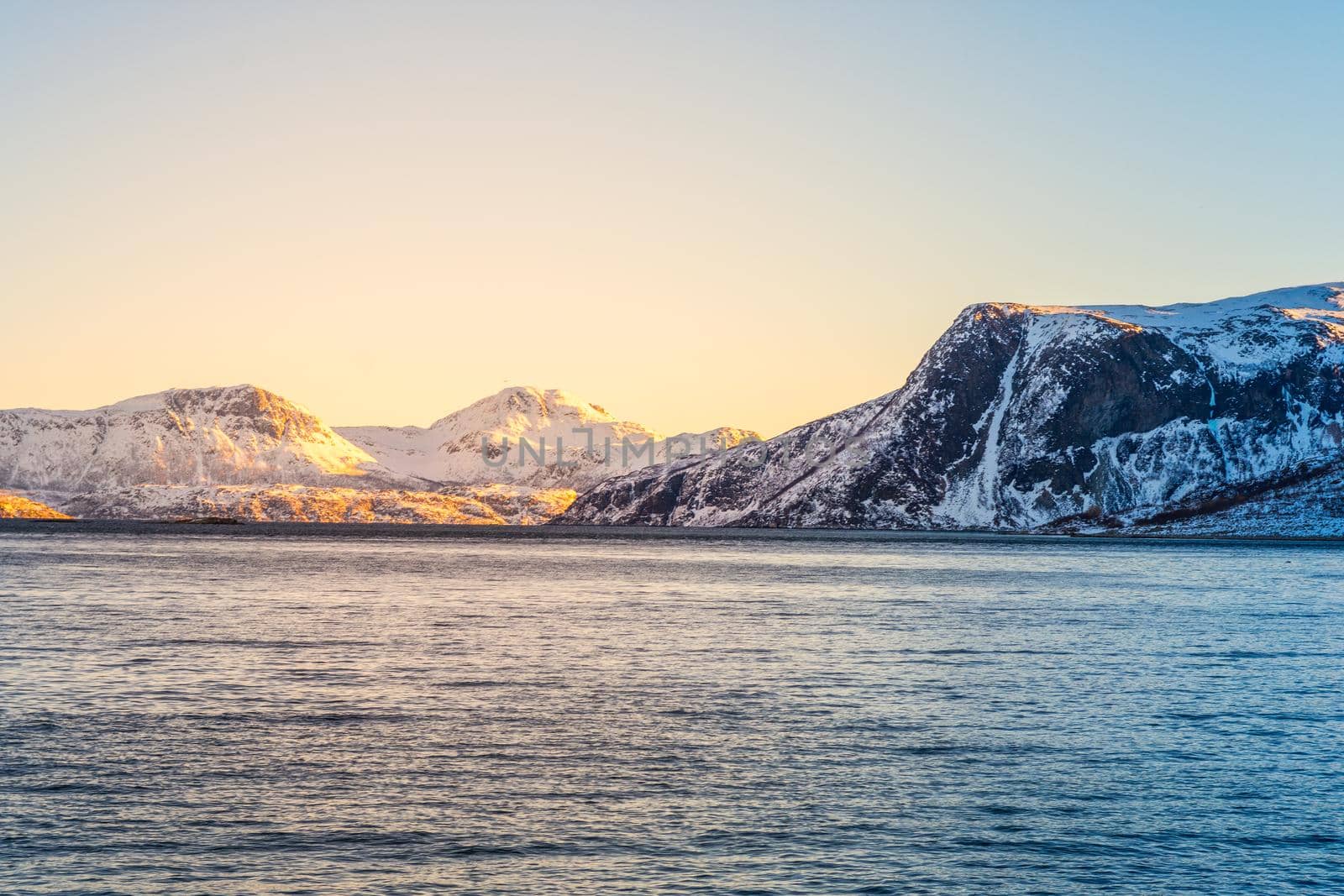 Norwegian Snow Mountains with Fjord close to Tromso