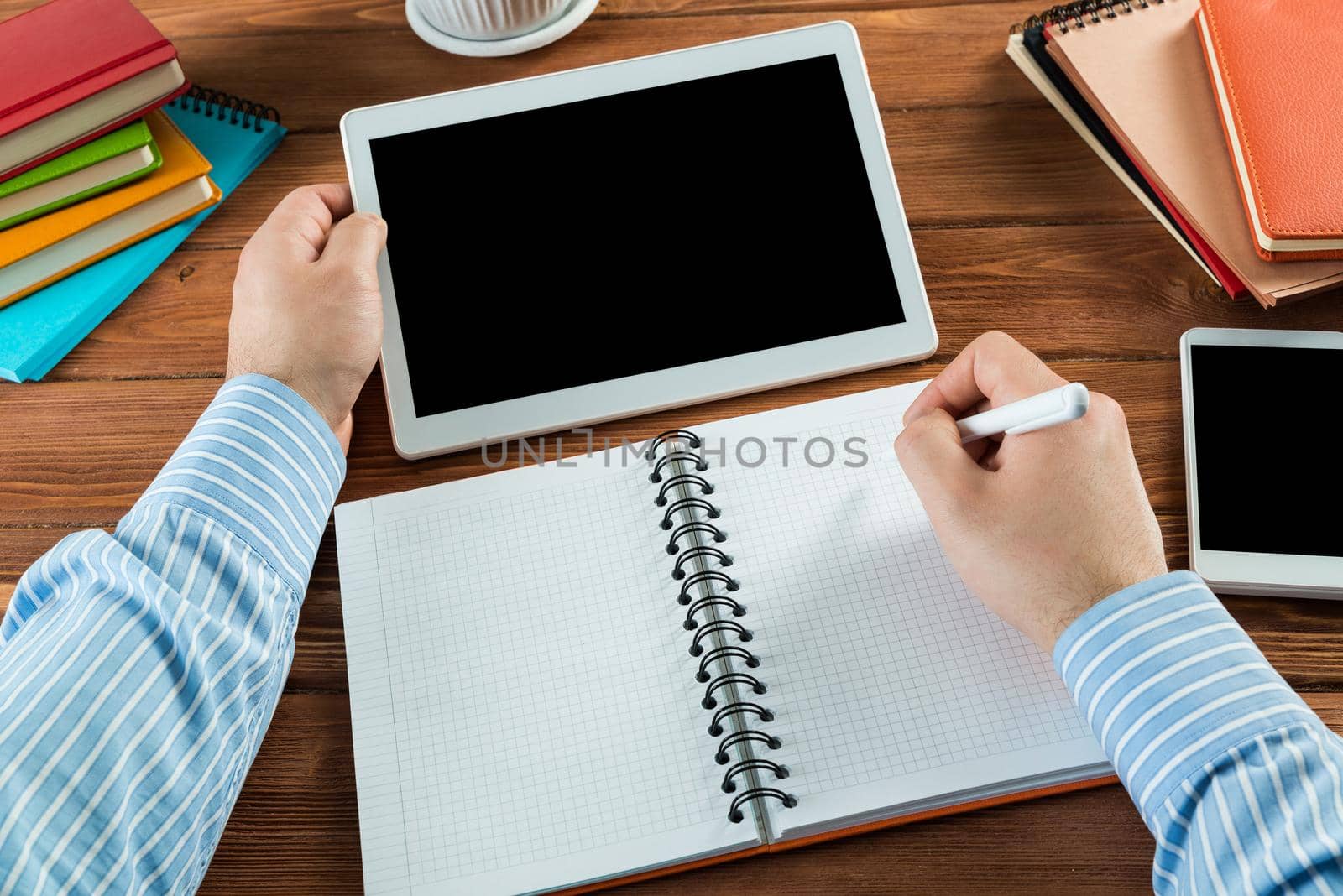 close-up of hands with notepad. office work