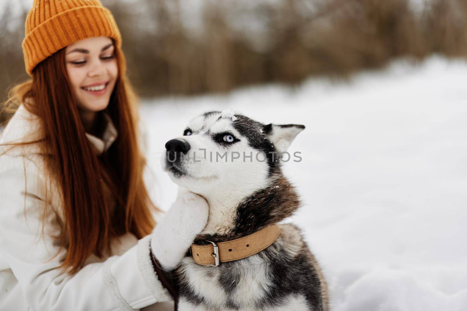 cheerful woman on the snow walk play rest Lifestyle by SHOTPRIME