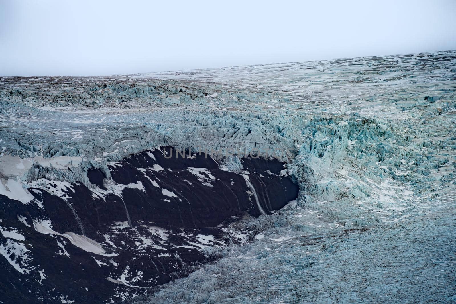 Massive glacier on top of the mountains, long shot